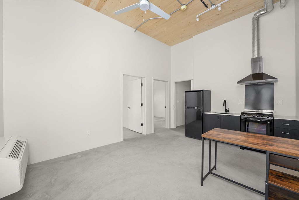 a kitchen and dining area in a 555 waverly unit