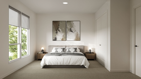 A bedroom with a large bed and a painting above it.