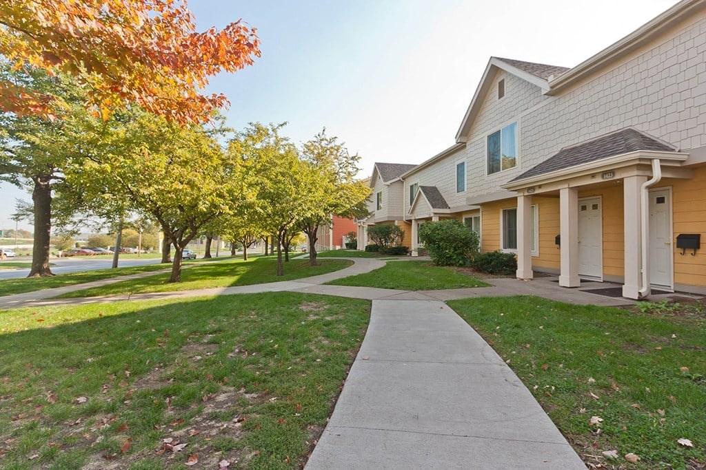 A residential area with houses and trees.