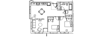 A floor plan of a unit with a kitchen, living room, and two bedrooms.