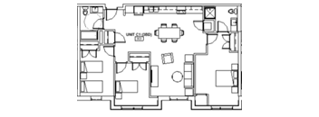 A floor plan of a unit with a kitchen, living room, and bedrooms.
