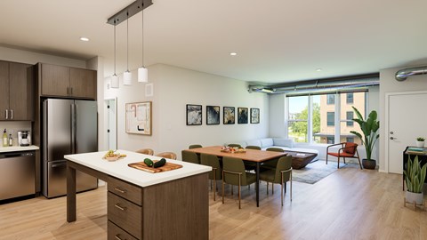 A modern kitchen with a dining table and chairs.