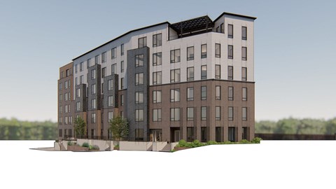 A modern multi-story apartment building with a mix of dark and light brown balconies.