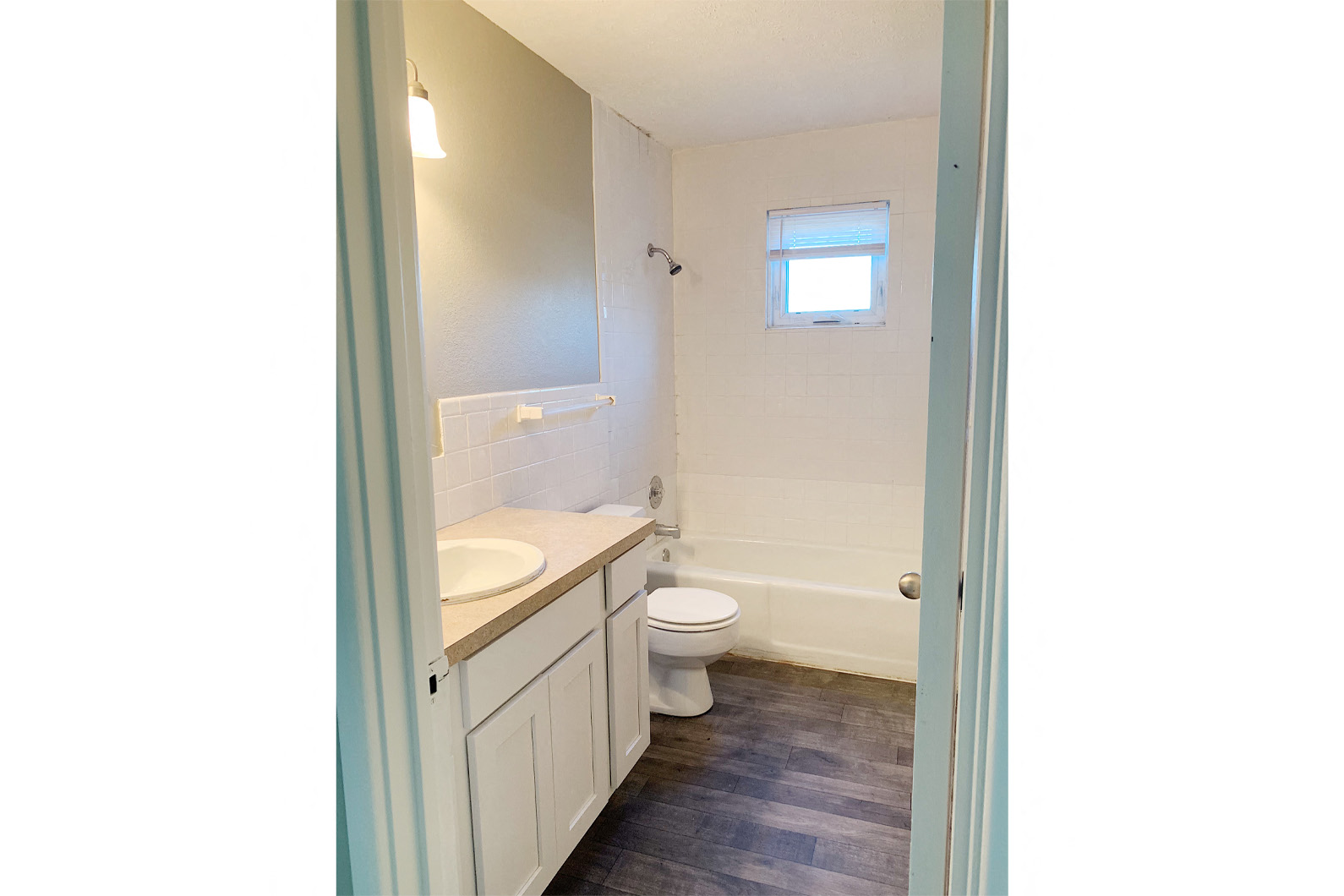 a bathroom with a toilet and a sink