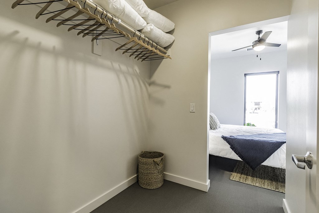 Studio, one and two bedroom apartment homes with stainless steel appliances, quartz countertops, backlit mirrors and large windows at 202 Railside in Springdale, AR