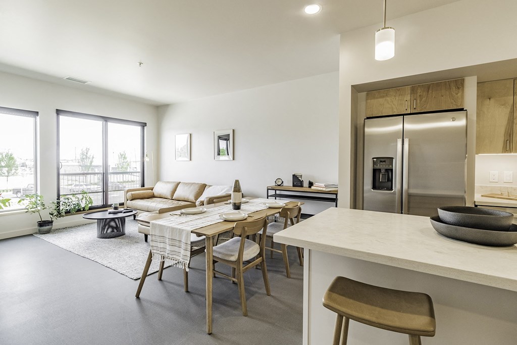 Studio, one and two bedroom apartment homes with stainless steel appliances, quartz countertops, backlit mirrors and large windows at 202 Railside in Springdale, AR