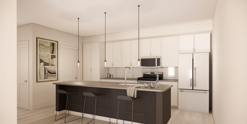 A modern kitchen with a bar stool and a painting on the wall.