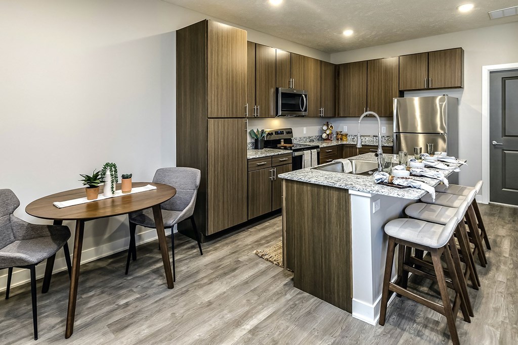 Studio, 1, 2 and villa-style homes featuring stainless steel appliances, granite coutertops, plank flooring, and many other amazing amenities at The 8801 in Lincoln, NE.