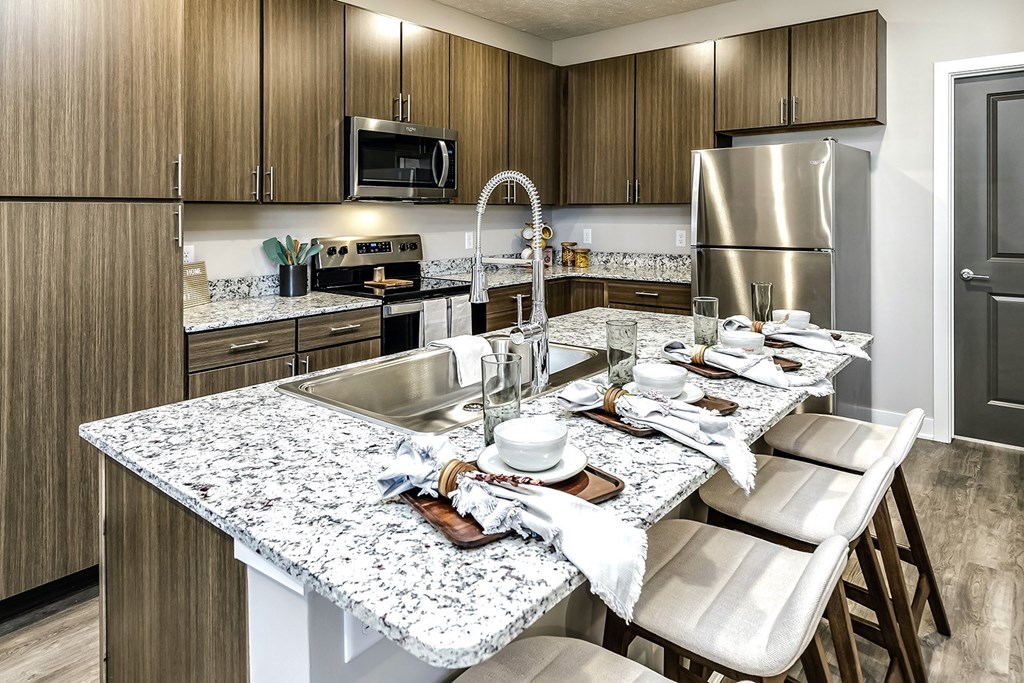 Studio, 1, 2 and villa-style homes featuring stainless steel appliances, granite coutertops, plank flooring, and many other amazing amenities at The 8801 in Lincoln, NE.