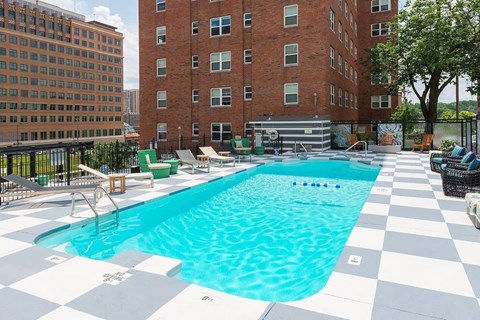 A large swimming pool with a checkered floor.