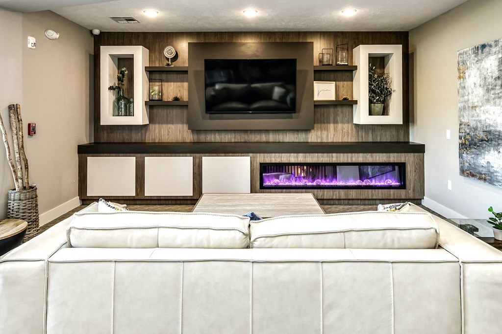 Luxury clubhouse with seating area at AXIS apartments in Papillion, NE