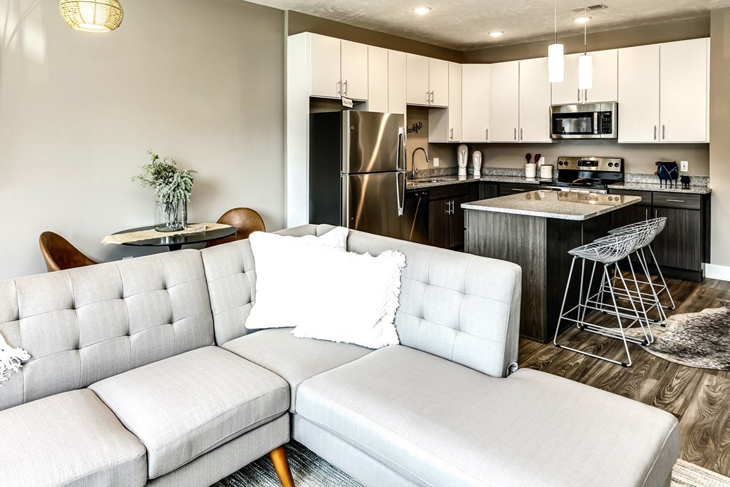 Two tone cabinet kitchens with extra storage and stainless steel appliances at AXIS apartments in Papillion, NE