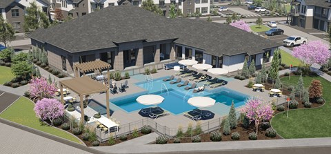 A large building with a pool in front of it.