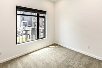 One, two and three bedroom apartment homes with stainless steel appliances, granite countertops, lvt flooring and much more at the Dalmore Apartments in Omaha, NE - Photo Gallery 6