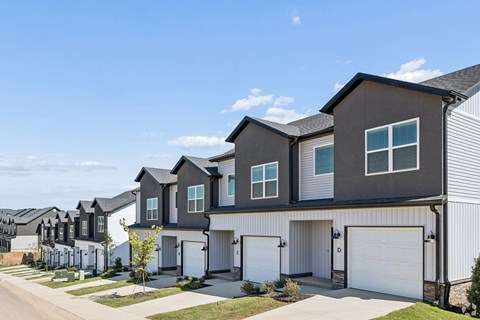 A row of modern houses with garages.