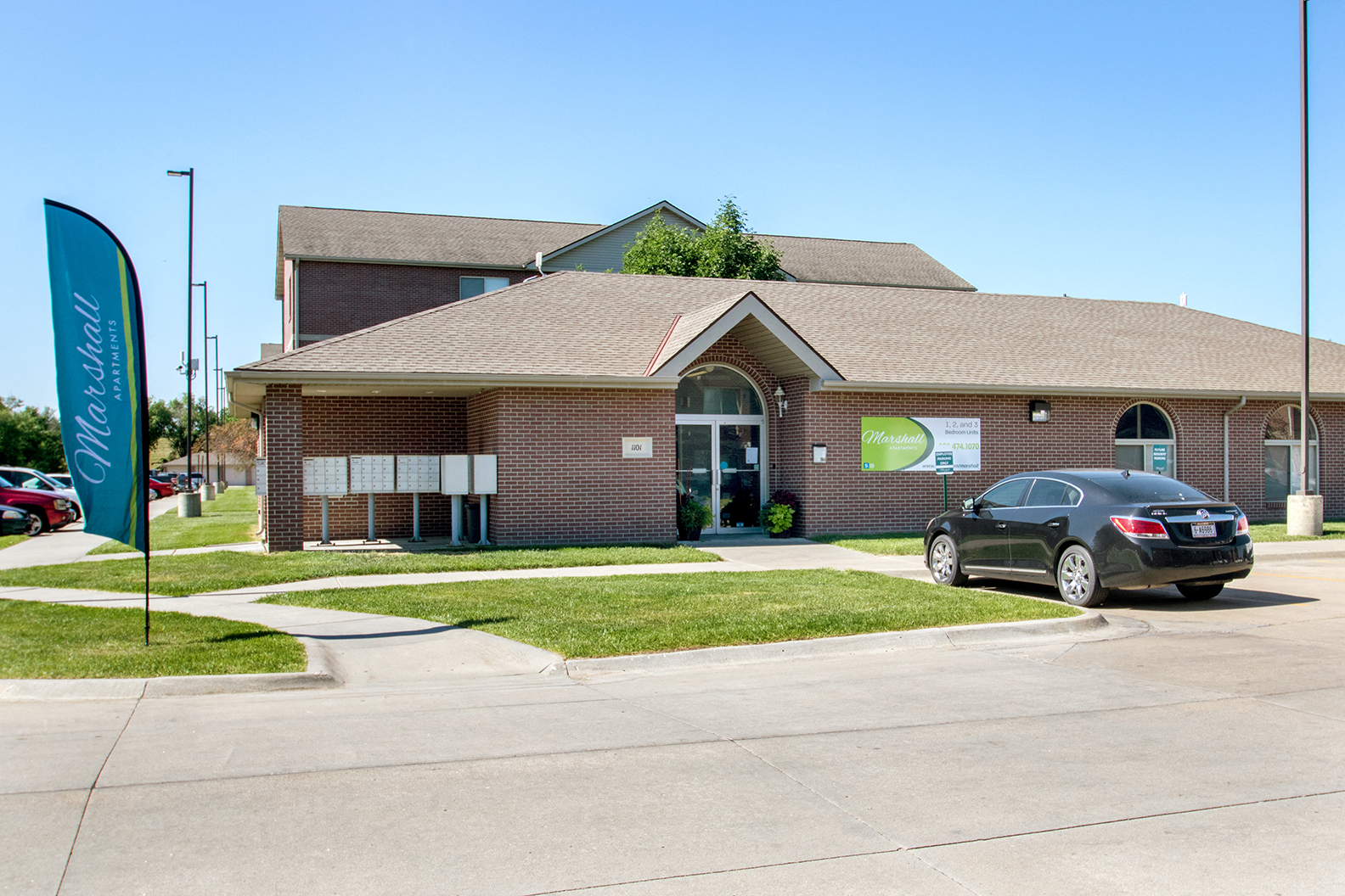 a building with a car parked outside of it