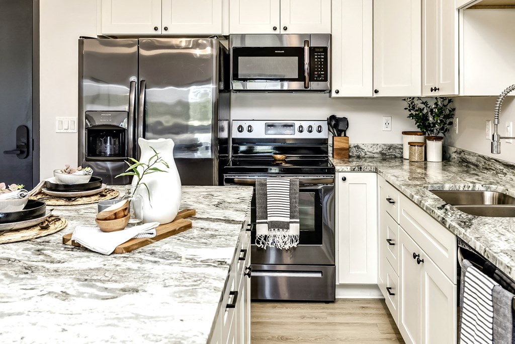 Large stylish kitchens with stainless steel appliances at Edge 204 Apartments in Omaha, NE