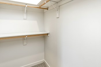 Large walk-in closets with ample storage at Edge 204 Apartments in Omaha, NE - Photo Gallery 4