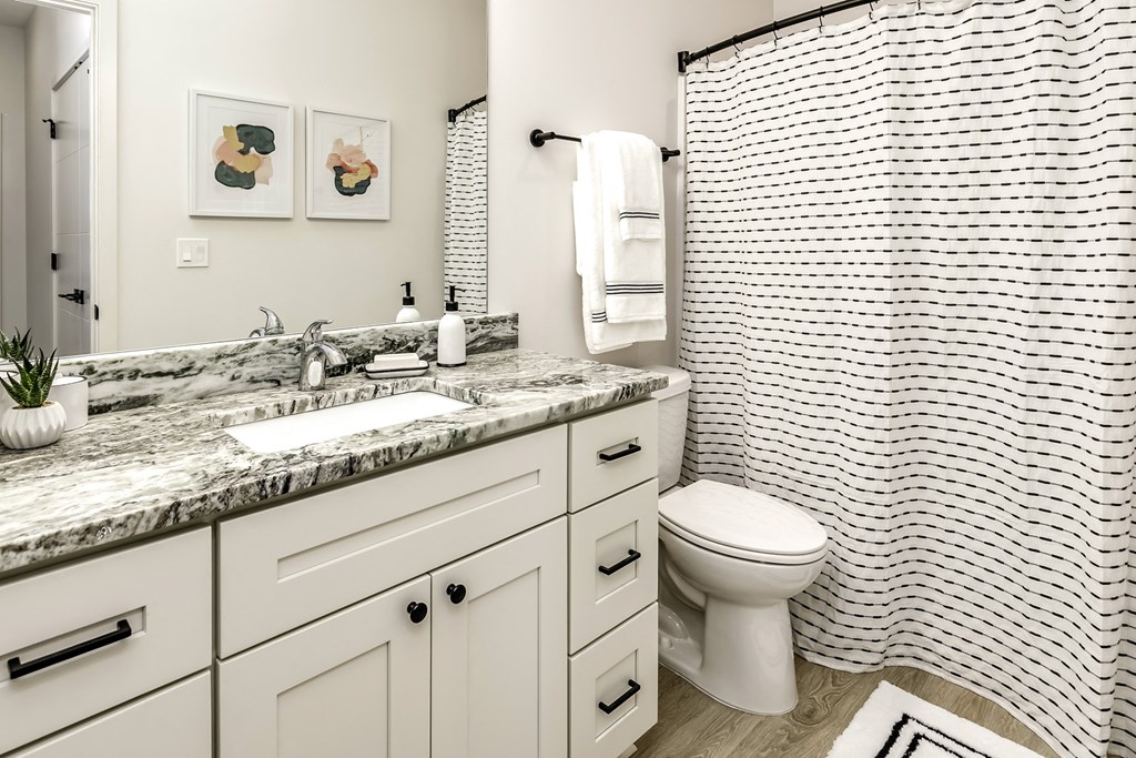 Large bathrooms with granite countertops at Edge 204 Apartments in Omaha, NE