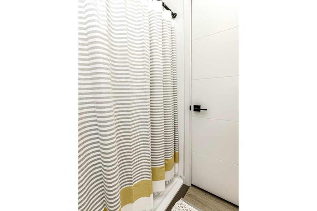 Large bathrooms with granite countertops at Edge 204 Apartments in Omaha, NE