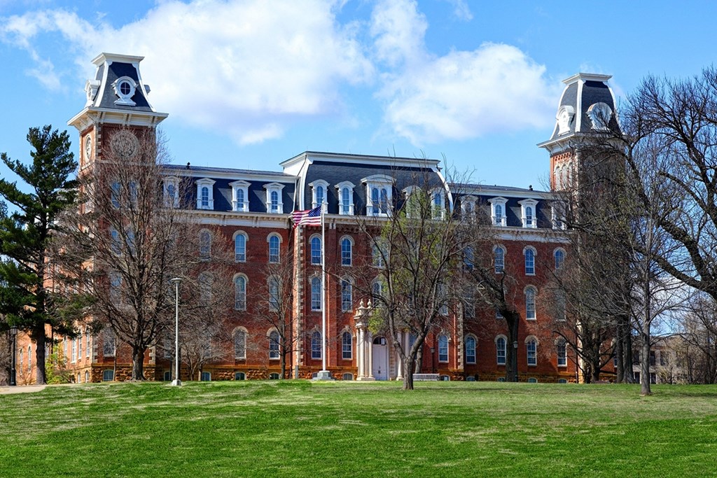 a large brick building with a clock tower on top of it