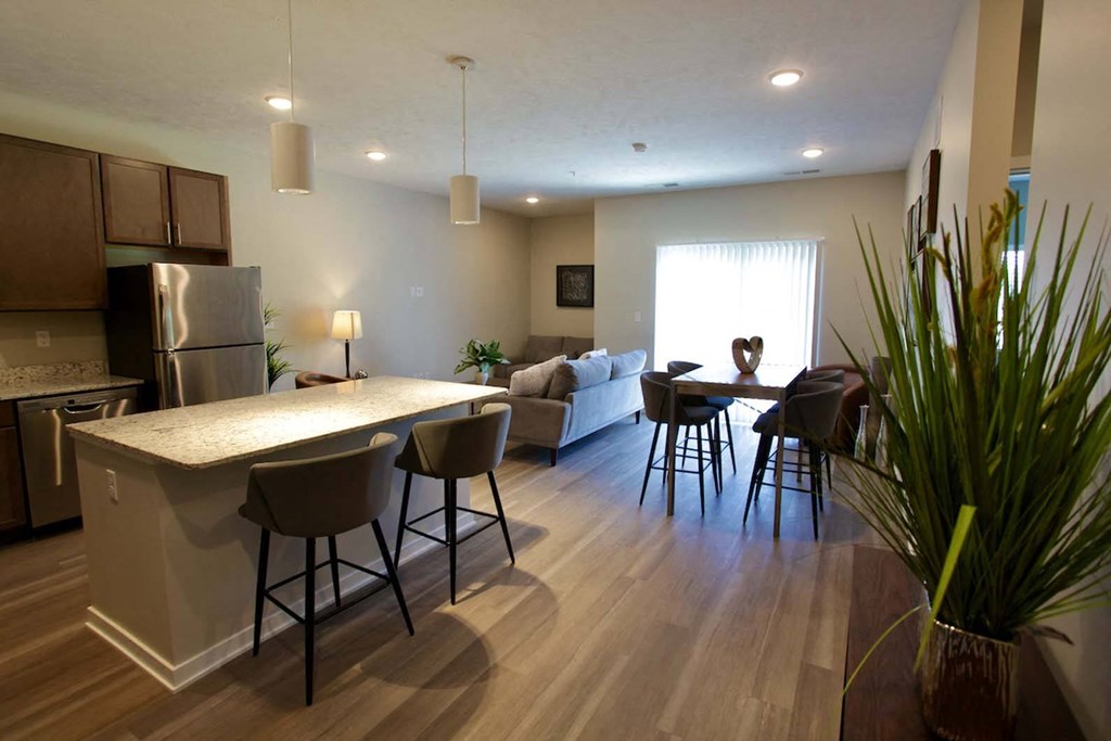 Open concept floor plans with wood plan flooring at The Flats at 5th in Columbus, NE