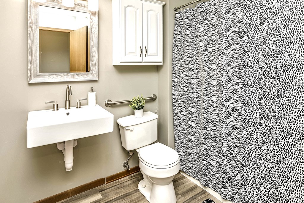 Two bedroom apartment homes with large kitchens and plank flooring at Flatwater in Omaha, NE