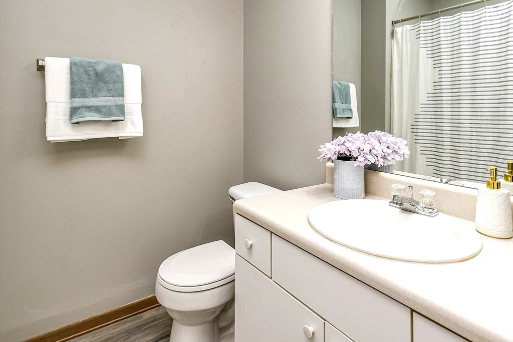 Two bedroom apartment homes with large kitchens and plank flooring at Flatwater in La Vista , NE