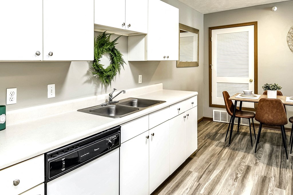 Two bedroom apartment homes with large kitchens and plank flooring at Flatwater in La Vista , NE