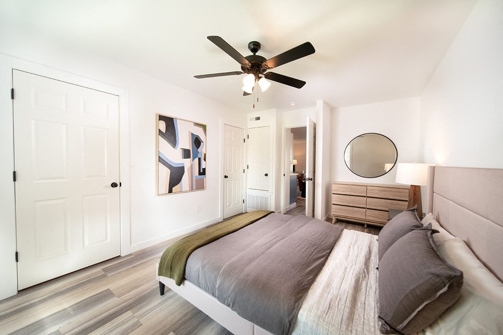 Remodeled apartment homes featuring premium appliances, custom cabinetry, lighting, and LTV flooring at Greenway Flats in Fayetteville, AR.