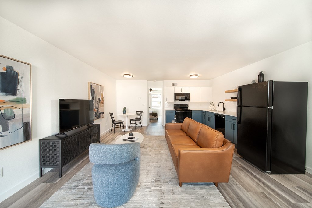 Remodeled apartment homes featuring premium appliances, custom cabinetry, lighting, and LTV flooring at Greenway Flats in Fayetteville, AR.