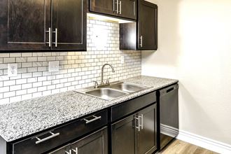 Beautiful newly-renovated one, two and three bedroom apartment townhomes with high-end finishes at Highpoint Apartments in Omaha, NE