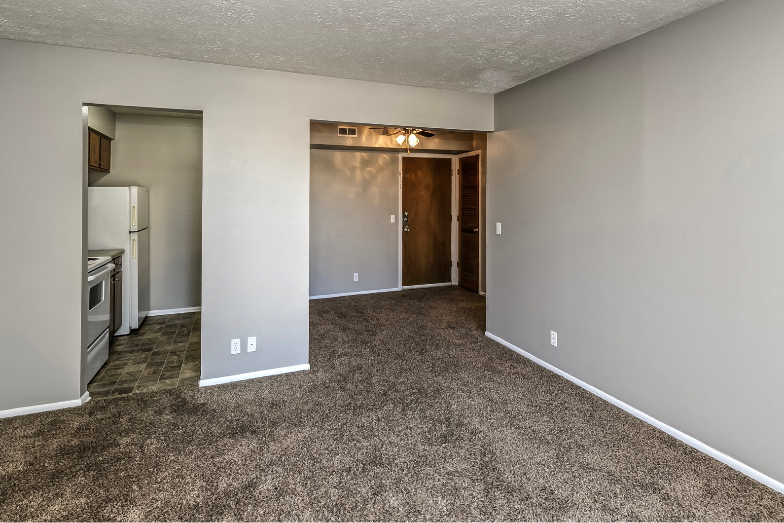 Large living rooms at Howard Street Apartments, Omaha, NE