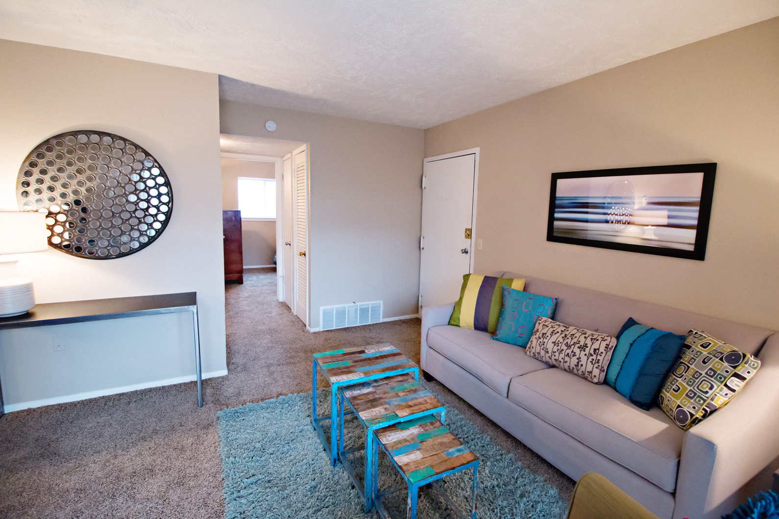 a living room with a couch and a coffee table