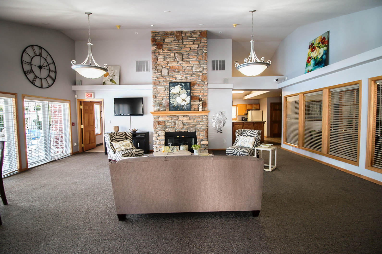 a living room with a fireplace and a couch