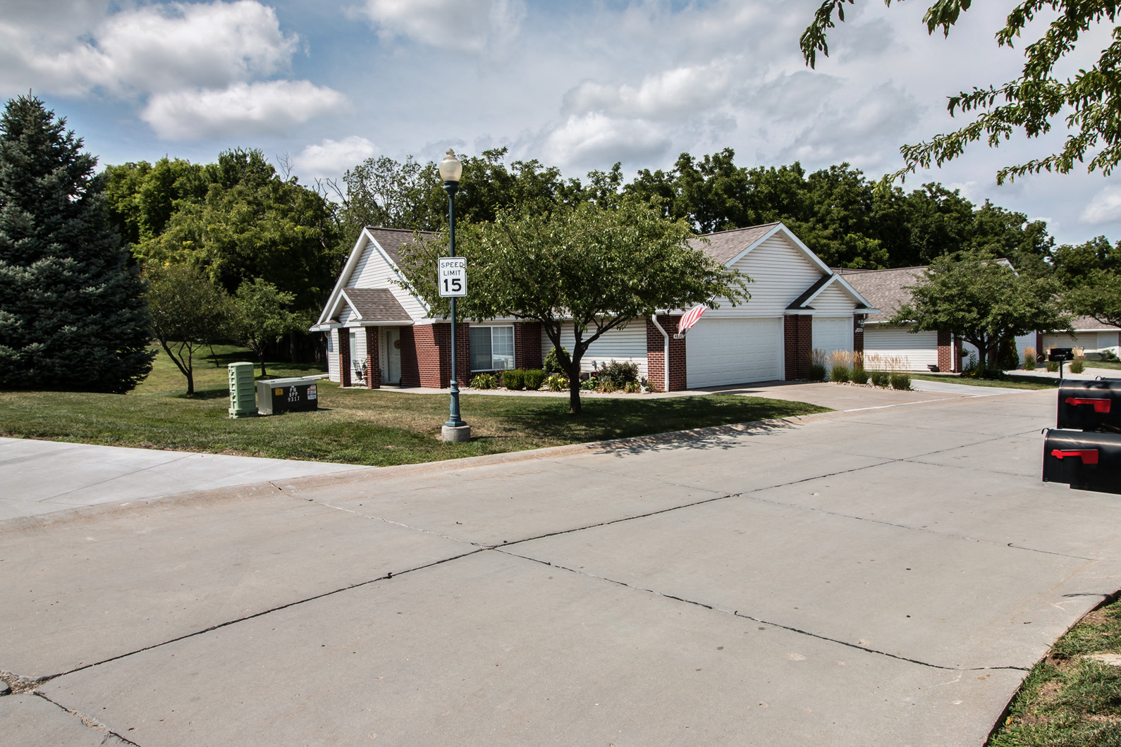 a street with houses in a suburban neighborhood