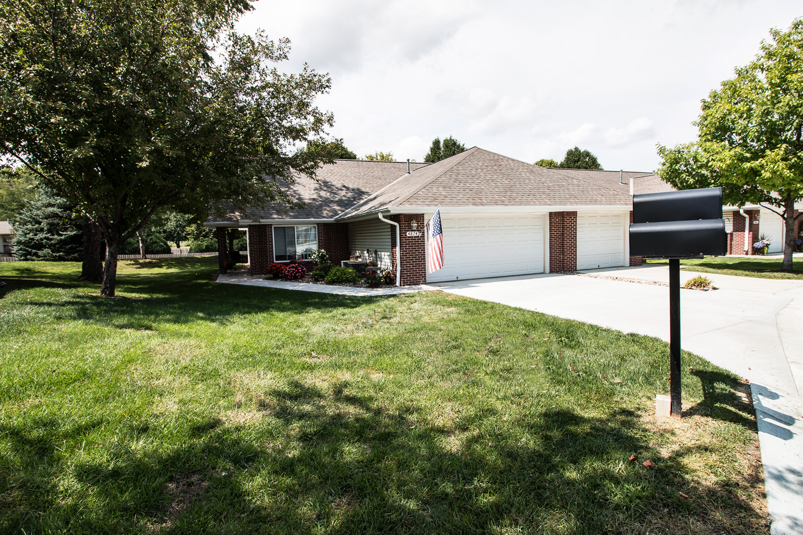 a house with a mailbox in front of it
