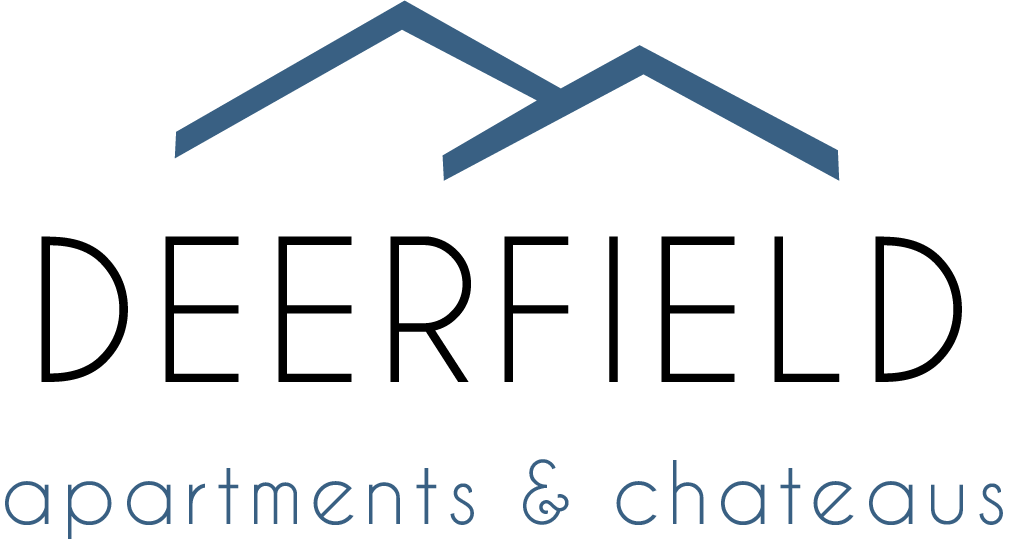 A logo for Deerfield apartments and chateaus.