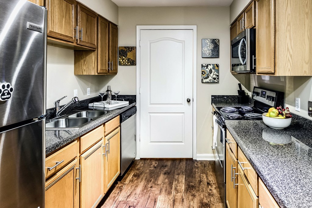 Large kitchens with stainless steel appliances at The Larimore, Omaha