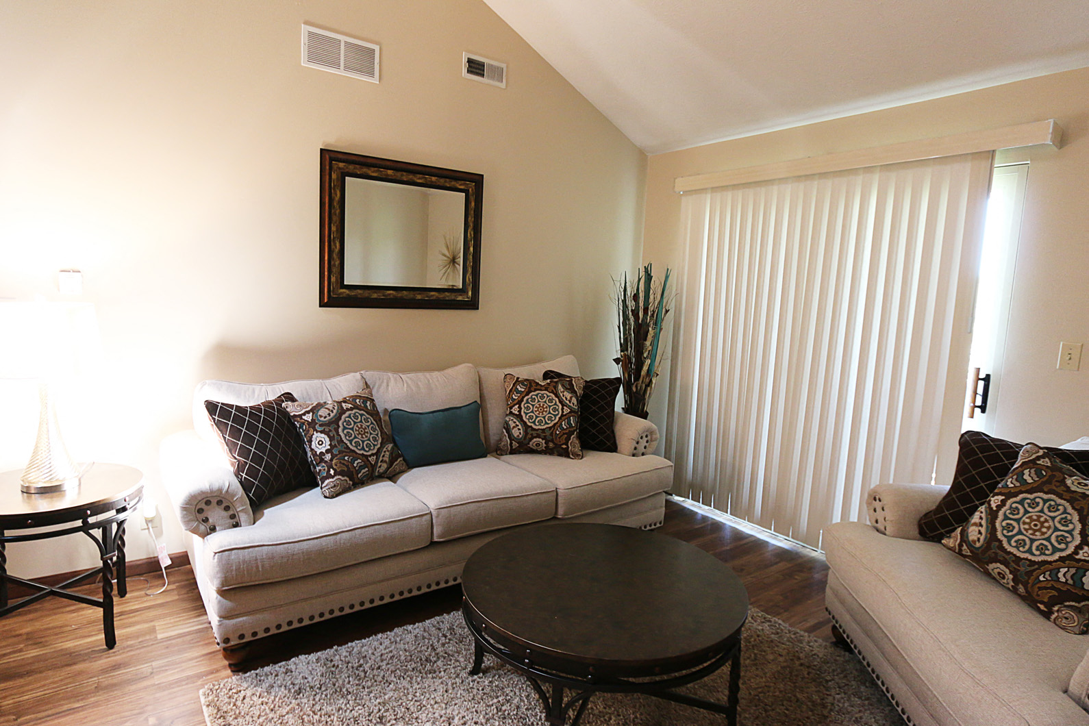 a living room with a couch and a table