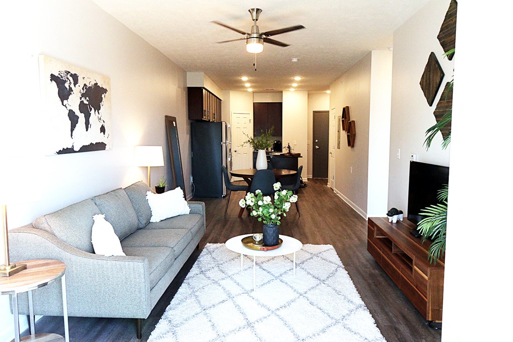 a living room with a couch and a table