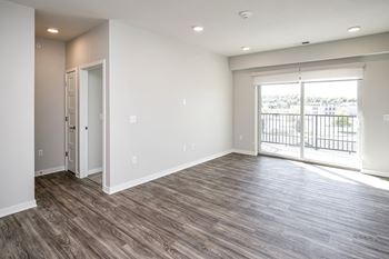 One, two and three-bedroom floor plans featuring two interior design schemes, quartz countertops, tile backsplash, stainless steel appliances, backlit mirrors, high-end finishes and more at 148 Place Apartments in Omaha, NE