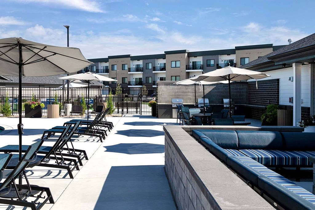 One, two and three-bedroom floor plans featuring two interior design schemes, quartz countertops, tile backsplash, stainless steel appliances, backlit mirrors, high-end finishes and more at 148 Place Apartments in Omaha, NE