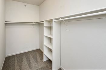 Walk-In Closets With Built-In Shelving at Autumn Grove Apartments, Omaha, 68135