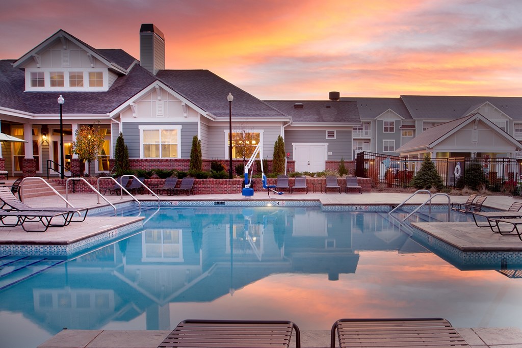 Resort-style pool with sundeck at Aventine Wilderness Hills in Lincoln, NE