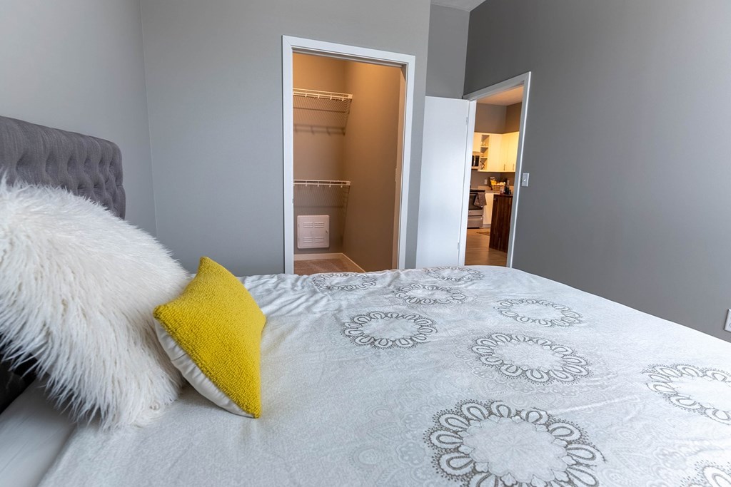 Studio, one, and two-bedroom apartment featuring stainless steel appliances, artistic industrial design, custom butcher block island, in-unit washer and dryer, and more at Benson Lights Apartments in Benson, NE