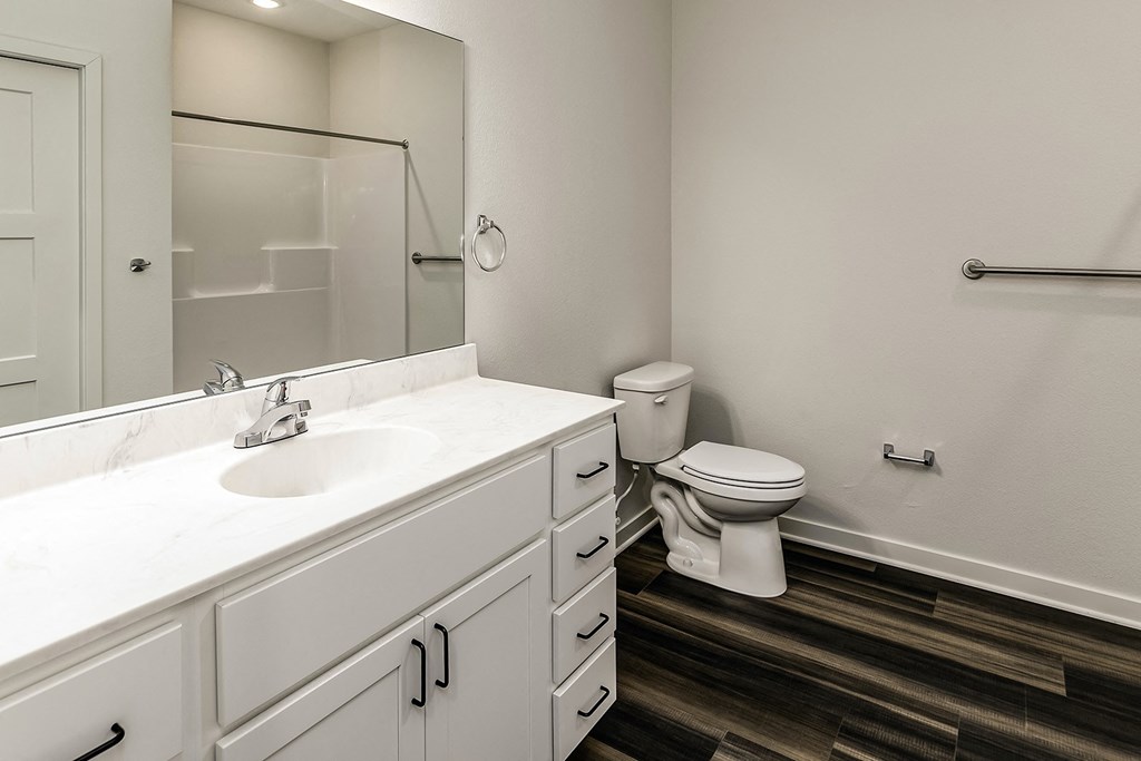 New building with white and dark color schemes with one, two and three bedroom apartment homes at CopperCreek Apartments in Council Bluffs, IA