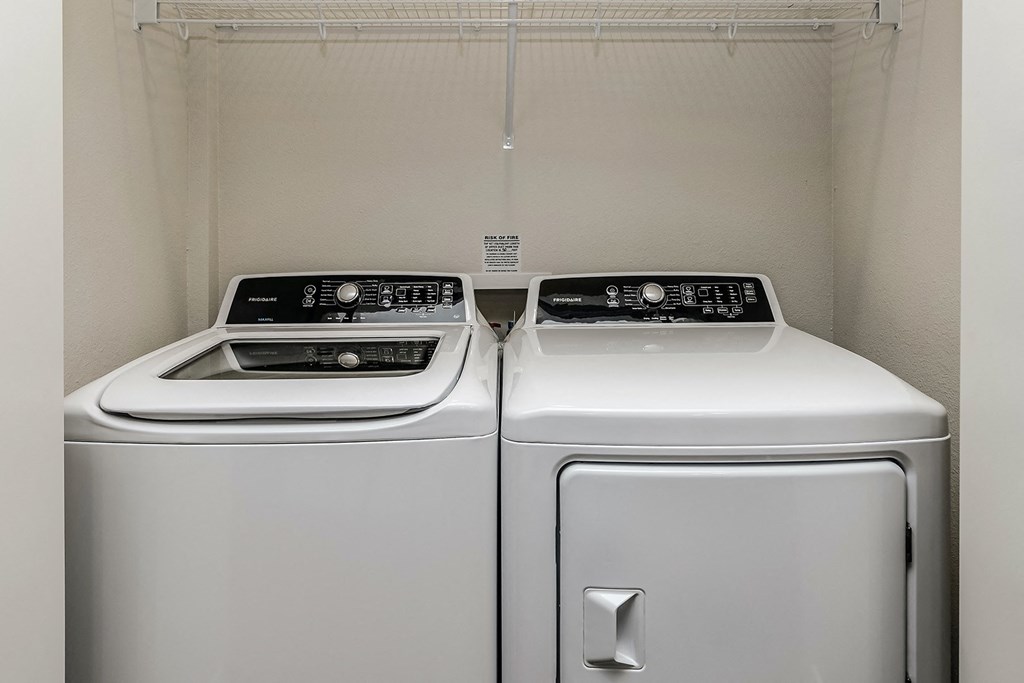 New building with white and dark color schemes with one, two and three bedroom apartment homes at CopperCreek Apartments in Council Bluffs, IA