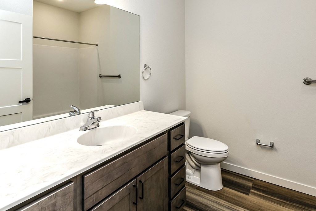 New building with white and dark color schemes with one, two and three bedroom apartment homes at CopperCreek Apartments in Council Bluffs, IA