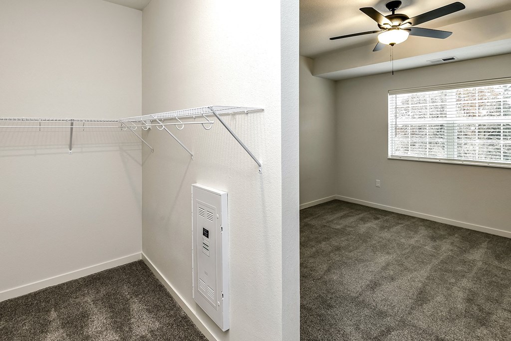 New building with white and dark color schemes with one, two and three bedroom apartment homes at CopperCreek Apartments in Council Bluffs, IA